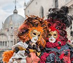 VENICE, ITALY - FEBRUARY 27, 2014: Unidentified person with Venetian Carnival mask in Venice, Italy on February 2014. 
In 2014 was the Venetian Carnival held between 15 February and 4 march